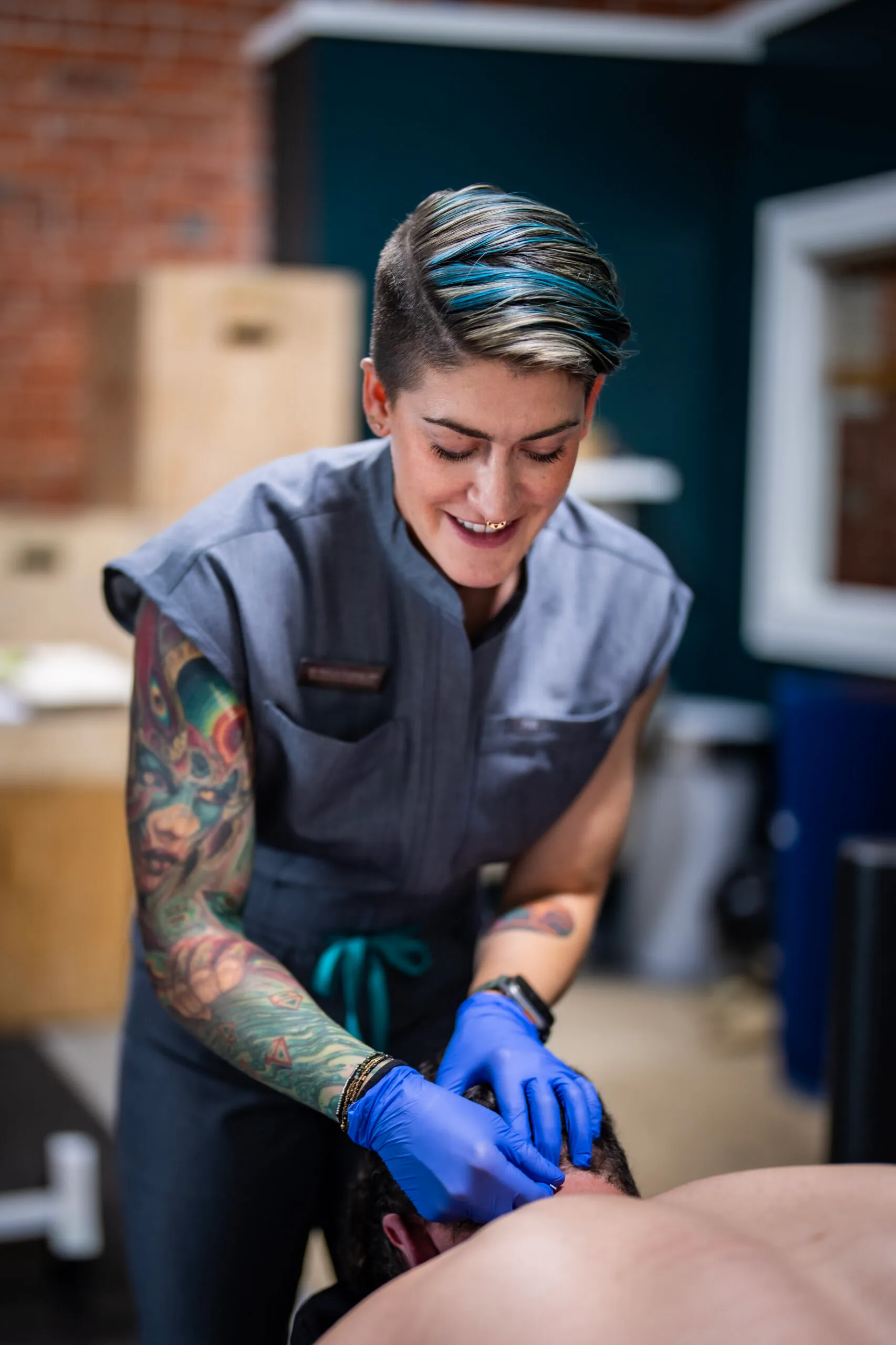 Dr. Marlisa Overton providing hands-on physical therapy treatment